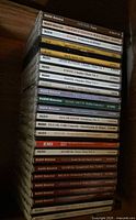 Stack of Naxos and EMI classical music CDs showing multiple titles such as Foote chamber music, Elgar cello concertos, Dvorak symphonies and piano trios.