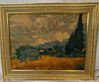 Full view of the framed print showing Van Gogh's artwork with a gold wooden frame featuring detailed trim.