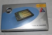 Front of the sealed Palm IIIxe box showing product image and branding