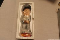 Whitey Ford bobblehead in original white styrofoam packaging with plastic wrap