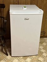 Front view of the white Master Chef compact freezer with logo visible.
