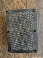 Top-down view of 3D metal pin art board showing densely packed pins within a rectangular black plastic frame