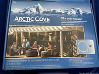Closed blue retail box of Arctic Cove 10 ft 3/8 in misting kit showing product image and branding.