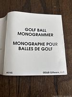 Instruction manual cover for Golf Ball Monogrammer with bilingual English and French text and model number #0145