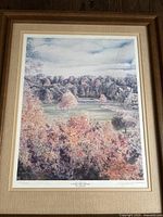 Full view of framed limited edition print showing the Glen Abbey Golf Club 7th hole, with autumn woods, golf green and sky.