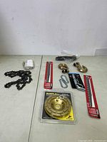 Overview of the tool and hardware accessories laid out on a table.