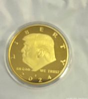 Close-up obverse side showing profile of Donald Trump with year 2024 and inscriptions.