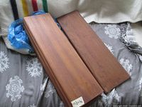 Two teak veneered bentwood shelves stacked, showing top surfaces and labels indicating dimensions on one shelf.