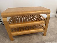 Front left angled view showing top surface and two slatted shelves