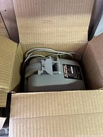 Mastercraft wet sharpener motor inside box showing wear.