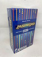 Front angled view of the sealed Password Classic Series game box showing multicolor stripe design and branding.