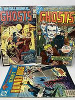 Two Ghosts comics and one Secrets of Haunted House comic showing front covers and colorful vintage art.