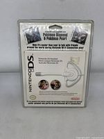 Back view of sealed Nintendo DS headset package showing compatibility with Pokémon Diamond and Pokémon Pearl games and images of headset.