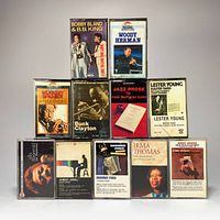 11 assorted vintage blues and jazz music cassette tapes displayed stacked and front-facing to show cover art and artist names.