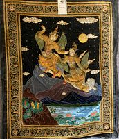 Full front view of embroidered Asian tapestry showing detailed figures flying over a mountain and lake scene with an ornate gold border.