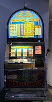 Front view showing illuminated Bonus Frenzy top display and main reel windows labeled 25¢ credits