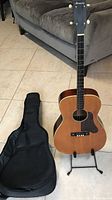 Harmony 4 string tenor guitar front view with gig bag included
