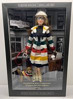 Front view of boxed limited edition doll and accessories