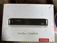 Front view of the white packaging box showing the image and model name of the NextBox 3.0 HDPVR set-top box by Rogers.