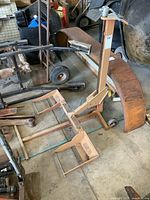 Front angle of metal lift showing frame and adjustable forks