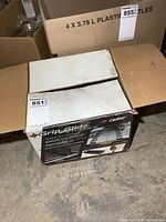 Closed and slightly opened box showing Caliber Grip Glide branding and product information for the 16 piece ramp set.