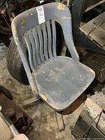 Painted solid wood vintage office chair with visible paint wear.