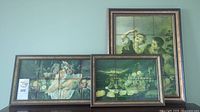 Photo of the three framed tile art panels showing the classical scenes and still life art