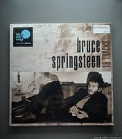 Front cover of Bruce Springsteen 18 Tracks 2-LP vinyl showing artist photo and title.