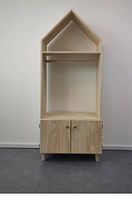 Front view of house-shaped solid pine wood wardrobe showing the entire piece on a grey floor with two-door cabinet and upper hanging rod under top shelf.