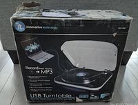 Original packaging box of Innovative Technology USB Turntable ITUT-400 showing product features and branding