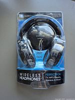 Front view of packaged wireless headphones showing brand and usage information.