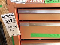 Exterior view of orange Craftsman tool chest with 5 drawers, showing overall condition and color.