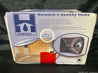 Box front showing Humidex branding, coverage up to 750 sq ft