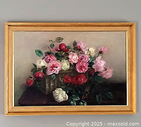 Full front view of framed floral oil painting hung on wall