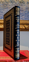 Front perspective view of the spine and front cover of the leather bound book "Fathers and Sons" by Ivan Turgenev showing detailed gold embossing and raised spine hubs.