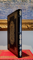 Front cover and spine of the leather bound book 'The Prince' featuring gold decoration and title on spine.