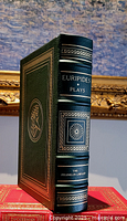 Full front view of the book spine showing title, decorative gold embossing, and raised spine hubs