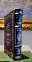 Front spine view showing the title 'Jane Eyre', author 'Charlotte Bronte', and 'The Franklin Library' imprint with gold decorations.