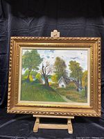 Full frontal view of framed painting showing entire artwork and frame