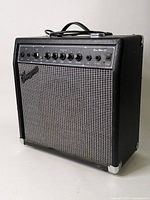 Front view of Traynor Bass Mate 25 black amplifier showing overall condition and construction.