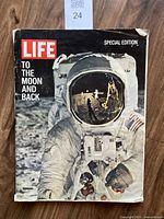 Front cover of the LIFE magazine showing an astronaut in a spacesuit on the Moon with the title 'TO THE MOON AND BACK'.