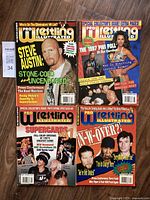 Photo showing four 1997 Pro Wrestling Illustrated magazines including one with Steve Austin on the cover.