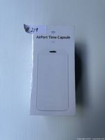 Front face of sealed white retail box showing device image and storage capacity