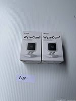 Front view of two boxed Wyze Cam v3 security cameras showing the camera image and branding on white packaging.
