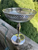 Overall view of pierced silverplate pedestal candy dish