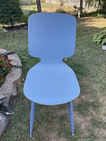 Front view of blue Hauser desk chair showing shape and color