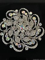 Front view of silver-tone rhinestone brooch showing stone arrangement