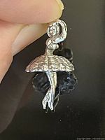 Front view of sterling ballerina pendant charm