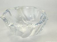 Clear octagonal Swedish crystal bowl shown from an angle highlighting the shape and facets.