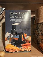 Boxed Reston Lloyd Multi-Purpose Grater showing product image and details on packaging.